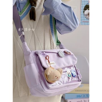 二次元斜挎包日系ins大容量百搭郵差包谷子透明吧唧扎板痛包娃包