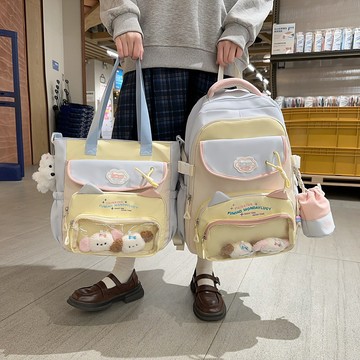 批發小衆初中生書包高顏值學院風少女雙肩包牛津布可愛卡通娃包女