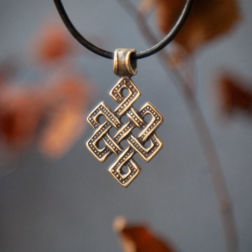 無盡結墜飾。生命之結手工項鍊。藏傳標誌飾品。