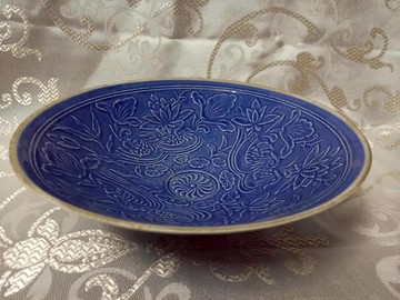 北宋定窑藍釉銘刻駌鴦荷塘碗