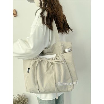 原創蝴蝶結托特包女輕便布包時尚百搭通勤單肩布袋大容量學生上課