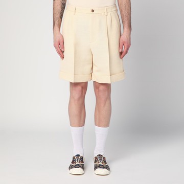 Butter-coloured Bermuda shorts with turn-ups