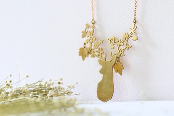 Wooden stencil deer  necklace by linen.