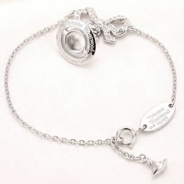 Vivienne Westwood Octavie 925純銀 水鑽蝴蝶結 白水晶土星墜飾手鍊(銀色)