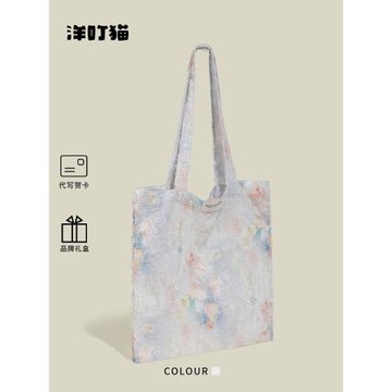 洋叮貓韓系慵懶風碎花帆布包女2025新款秋冬大容量百搭通勤單肩包