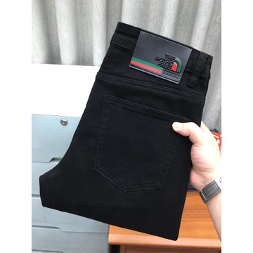 黑色牛仔褲男秋冬款歐貨高端潮流百搭彈力休閑純黑色修身小腳長褲