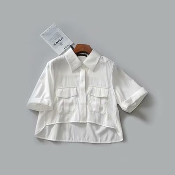 外貿女裝夏新歐美OL風薄款前短后長高腰口袋飾露肚臍短袖白色襯衫