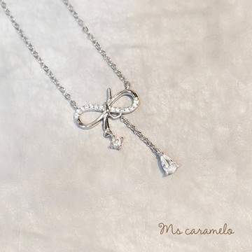 【焦糖小姐 Ms caramelo】925純銀鍍K白 蝴蝶結項鍊