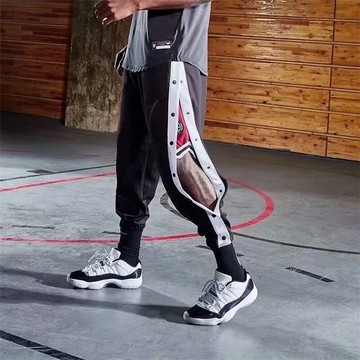 特殊設計排釦縮口運動長褲