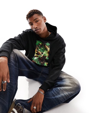 ASOS DESIGN oversized hoodie in black with art front print