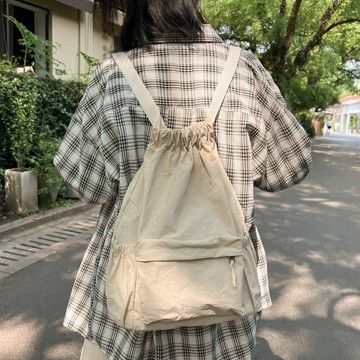 雙肩揹包新款純色簡約睿營束口袋高顏值潮情侶出行大容量學生書包