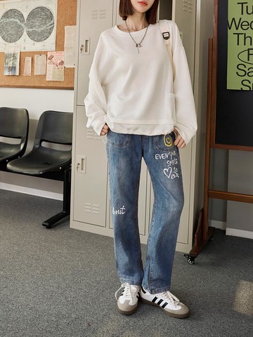 水洗刷色英文印花牛仔哈倫褲