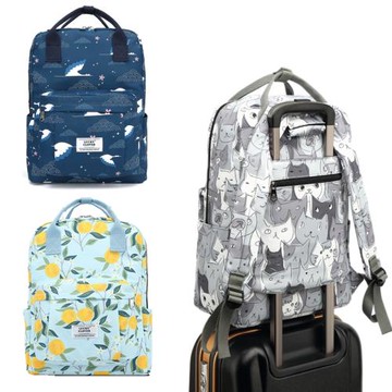 韓版防水印花雙肩包休閑手提背包女初中學生書包男可套拉桿電腦包