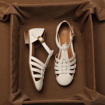 真皮包頭涼鞋女2025新款夏季外穿百搭時尚編織鏤空平底羅馬豬籠鞋