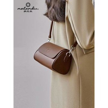 納蘭杜女士包包2025新款斜挎包女小包高級感女式真皮圓筒超火女包