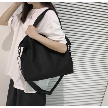 東諾簡約大容量休閑電腦包時尚男女單肩健身包斜挎包通勤購物袋