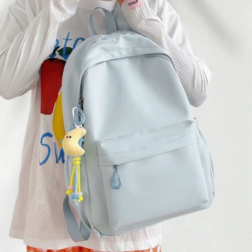 新款小眾純色雙肩包女生大容量初中高中大學生書包男輕便旅行背包