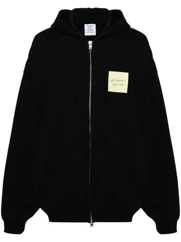 VETEMENTS - logo-patch zip-up hoodie - men - Cotton/Cotton/Polyester/Polyester/Spandex/Elastane - M - Black