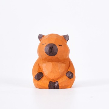 Cleo 平靜休憩的卡皮巴拉水豚木雕