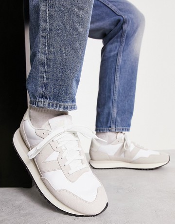 New Balance 237 trainers in white and grey