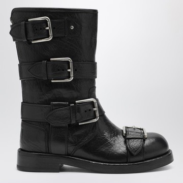 Black leather boots with straps