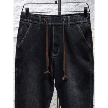 380斤松緊腰彈力加肥加大碼牛仔褲男寬松胖子哈倫潮抽繩束腳褲潮