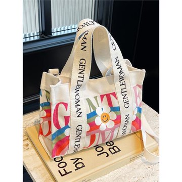 春夏小雛菊帆布包女包2025流行小花托特包度假包休閑字母斜挎小包