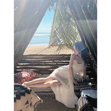 三亞旅游拍照衣服女海邊度假沙灘裙超仙白色露背吊帶連衣裙仙女裙
