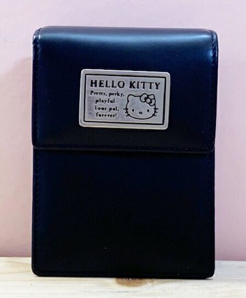 【震撼精品百貨】Hello Kitty 凱蒂貓 日本SANRIO三麗鷗KITTY化妝包/收納包-皮革25th黑*44149 震撼日式精品百貨