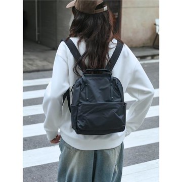 小眾英倫風防水學生雙肩包輕便百搭極簡旅行通勤小背包高級感休閑