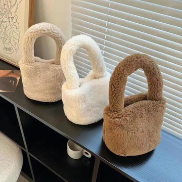 純色羊羔毛毛包包2025新款包包女拎包小眾毛茸茸手提包毛絨水桶包