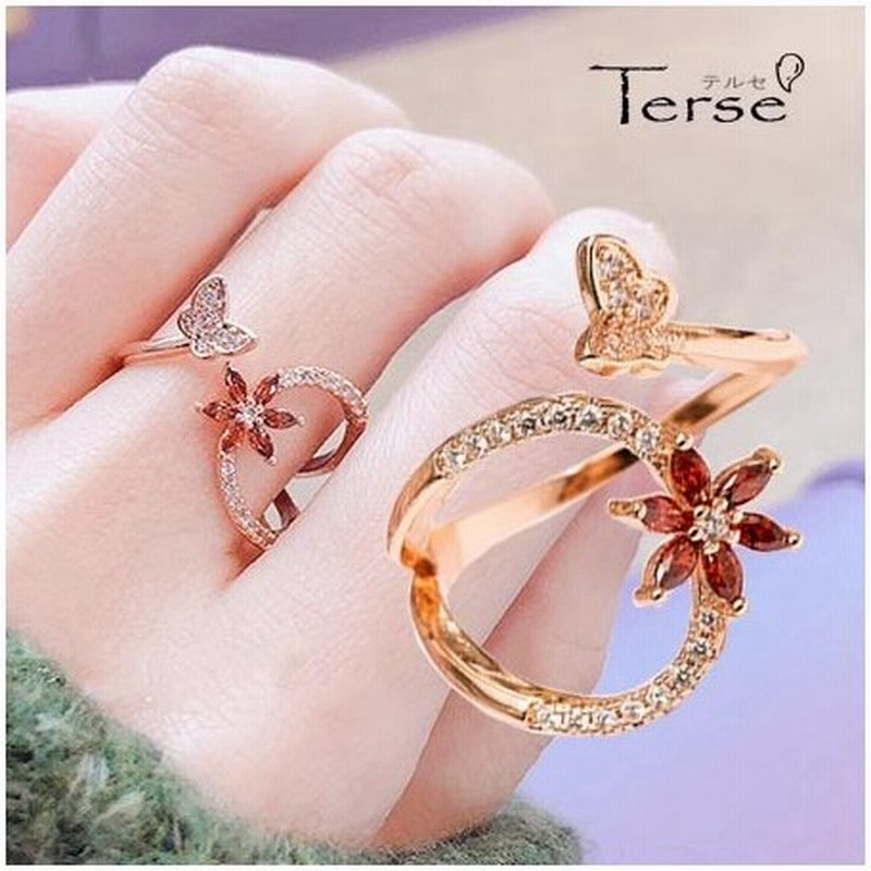 Terse 新作 ピンクゴールドとくるんとしたフォルムがキュート ジルコニアフラワーと蝶々のおしゃれリング レディース 指輪 バタフライ 花 12月誕生花 通販 Lineポイント最大0 5 Get Lineショッピング