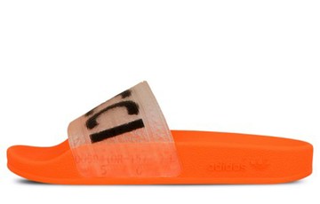 FIORUCCI X ADILETTE SLIDE SOLAR ORANGE