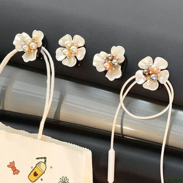 關注推送🍳車內掛鉤車用小掛鉤內飾多功能花朵副駕駛車上用汽車粘貼掛鉤前排