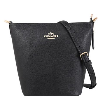 COACH CCL34 浮雕馬車LOGO防刮皮革斜背水桶包.黑/金