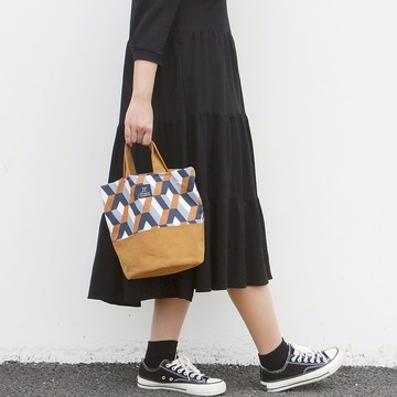 慢耕獨立設計ins風簡約幾何拼接帆布水桶包手提斜跨包