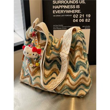 通勤托特包大容量松弛感包包女2025新款斜挎水桶包單肩針織毛線包