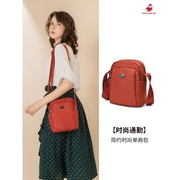 牛津布斜挎包女2026新款百搭小包包原創豎款女包火狐帆布包媽媽包