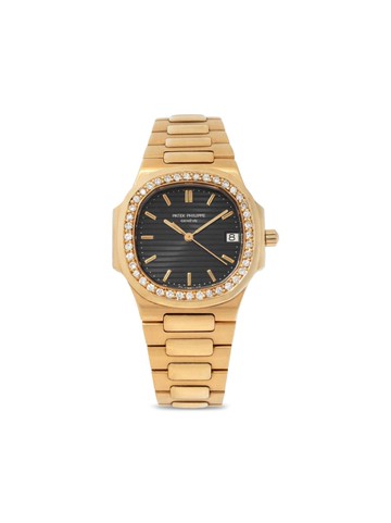 Patek Philippe - pre-owned Nautilus 32mm - unisex - 18kt Yellow Gold/Diamond - One Size - Black