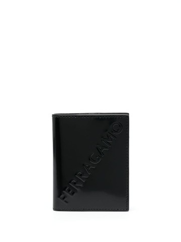 Ferragamo - logo-debossed bi-fold leather wallet - men - Calf Leather - One Size - Black