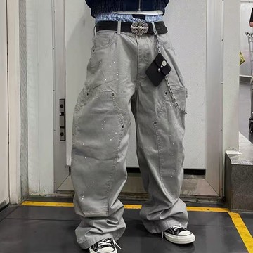 潮流青年痞帥刮爛潑墨水洗牛仔褲男新款寬鬆小直腳休閒褲男