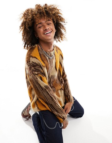 ASOS DESIGN overszied knitted fluffy all over pattern jumper in orange