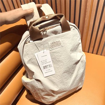 專柜貴牌正品輕便背包通勤雙肩包女包包男學生書包登山電腦旅行包