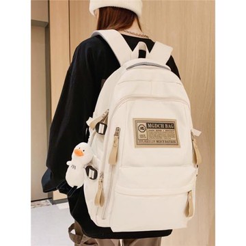 大學生簡約百搭電腦背包初中高中學生大容量雙肩包男潮減負書包女