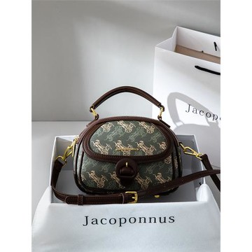 真皮老花綠色馬鞍包女2025新款潮高級感輕奢小眾通勤手提斜挎圓包