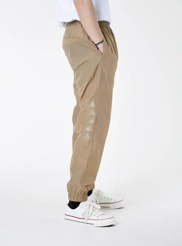 KAPPA 23中性輕量防潑水縮口運動長褲 (可可棕色)｜Kombat™ 341I34W