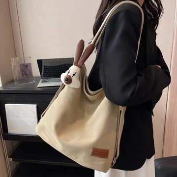 大學生上課包女2025新款百搭復古帆布包多功能上班通勤單肩腋下包