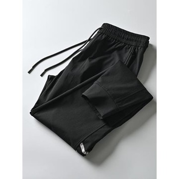 外貿原單剪標尾單男裝輕防水磨絨內里四面彈休閑束腳口九分運動褲