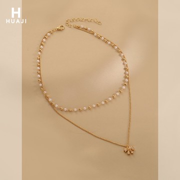 花跡蝴蝶結項鏈女2021年新款頸鏈輕奢小眾設計雙層疊戴珍珠鎖骨鏈