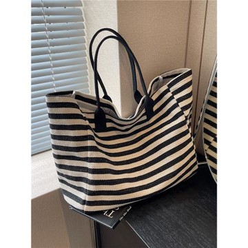 通勤包女大容量手提袋包包2025新款小眾斑馬紋帆布單肩媽咪托特包
